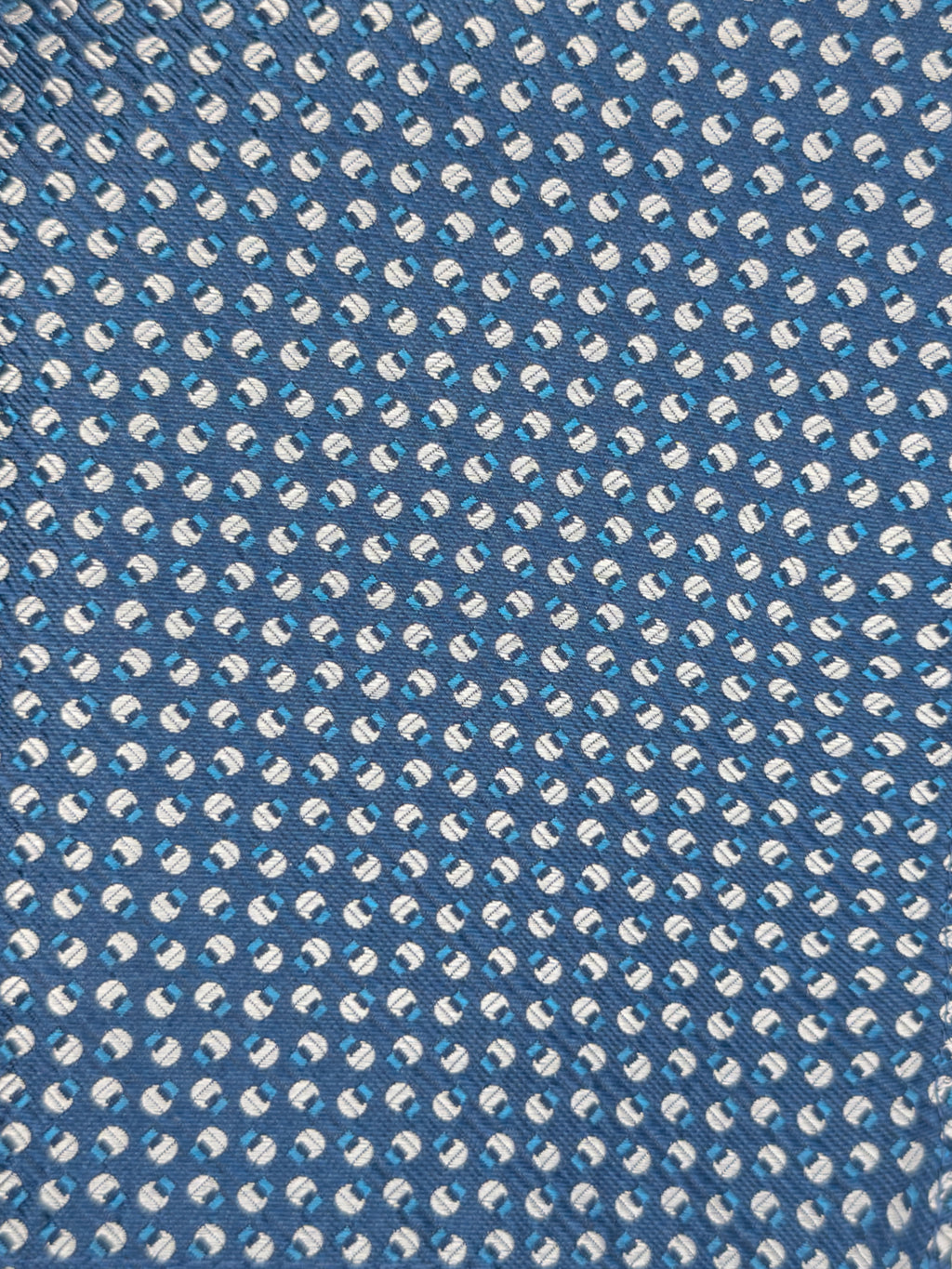 Pochette con fantasia alternata cerchi e quadri - color Blu e Argento image 1